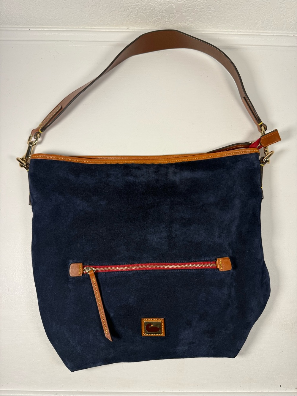 Dooney & Bourke Navy Suede Shoulder Bag with Tan Trim and Red Accent